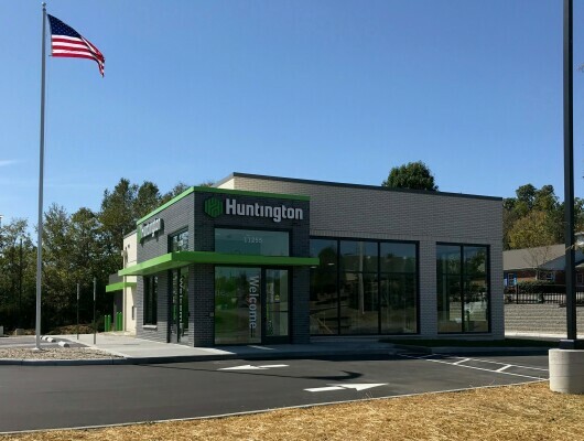 front view of Huntington Bank with flag